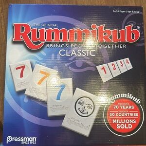 Rummikub -Fun family game. New, never opened.
